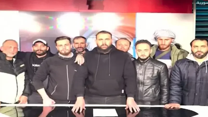 Groupe rebelles à la télévision publique syrienne