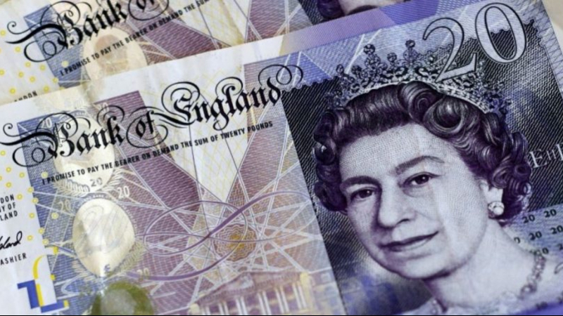 Angleterre : Le 'père Noël' et les milliers de billets de banque liasses de billets